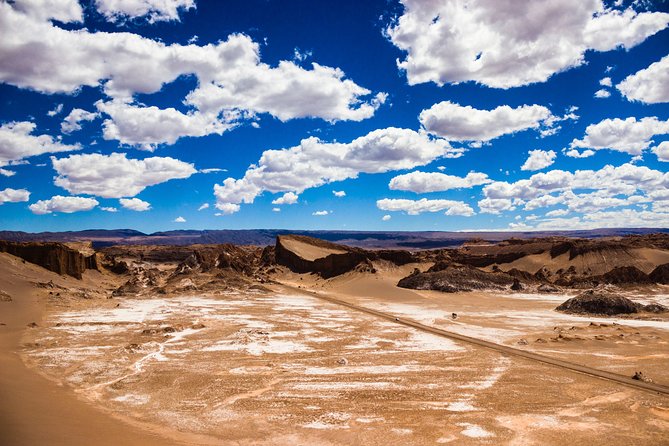 Full Atacama - SORBAC (group tours) - Day 5: Valle Arcoiris minerals, Hierbas Buenas petroglyphs, Toconao town time, and Laguna Chaxa flamingos