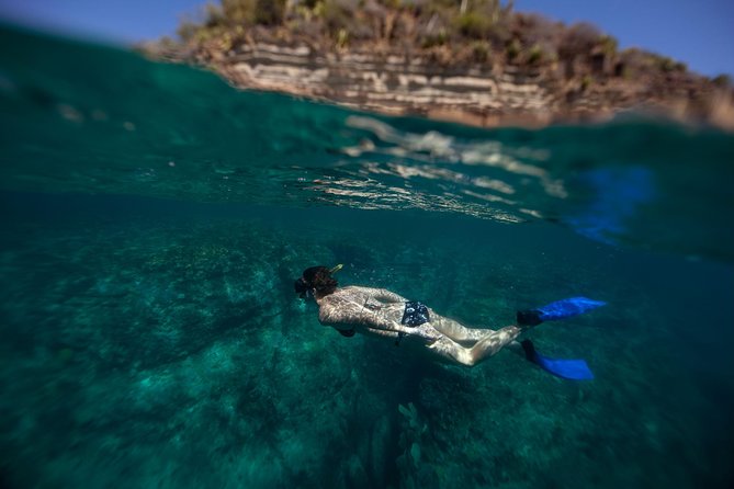 Power 360 Sightseeing and Snorkel Cruise Antigua - The island loop: Pillars of Hercules and Devil’s Bridge stops