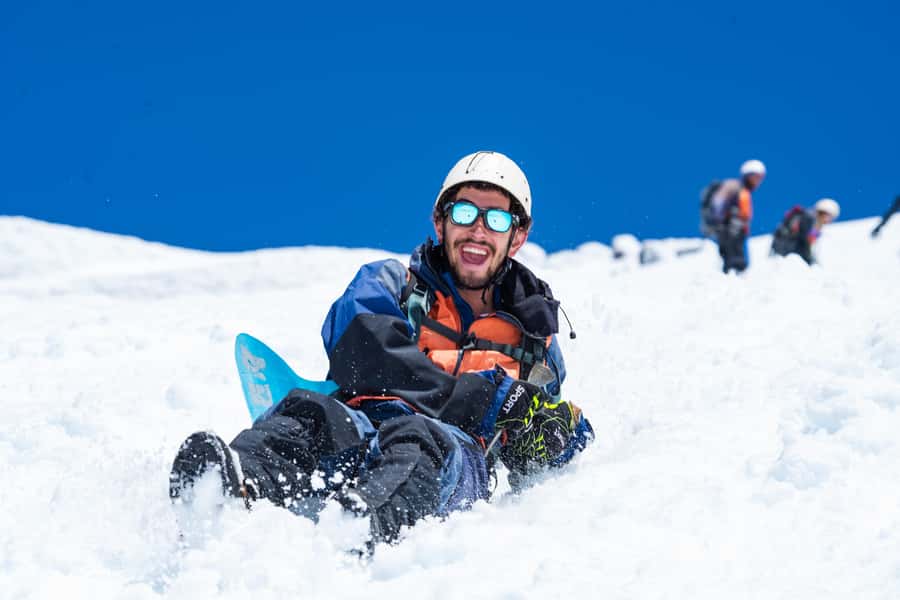 Pucón: Ascent to Villarrica Volcano - The Descent Choice: Snow Slides in Cool Months, Foot Down in Summer