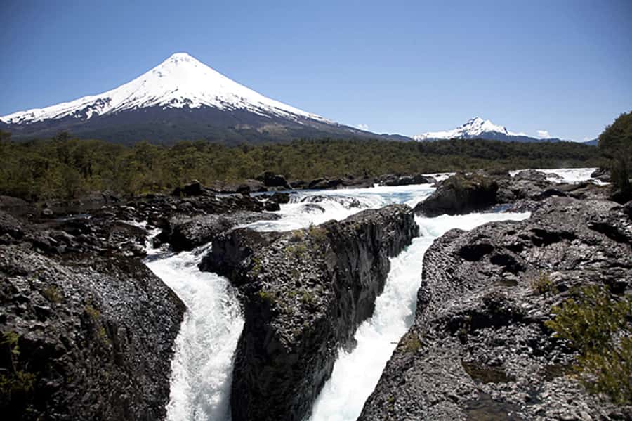 Puerto Varas: Osorno Volcano Day Trip by Air-conditioned Van - Ensenada, altitude, and arriving at the ski center at 1,240 meters