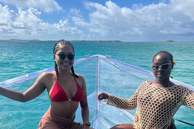 Reef Explorers Transparent Boat and Beach Tour - Deep Bay Beach time for swimming, sunbathing, and snorkeling
